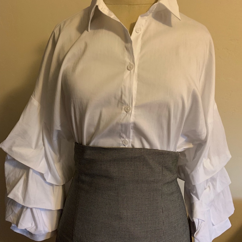White shirt, and a black pin stripe pencil skirt.